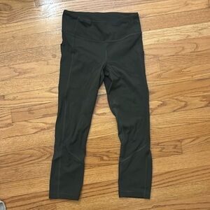 Dark green lululemon midrise leggings with pockets 25”